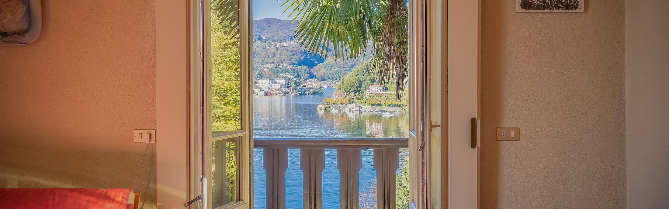 ORTA Appartamento vista isola, in villa d’epoca con parco secolare e darsena